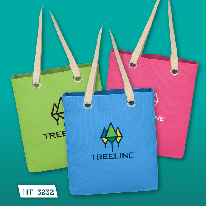 The HT_3232 Vibrant Cotton Canvas Tote Bag in green, blue, and pink.